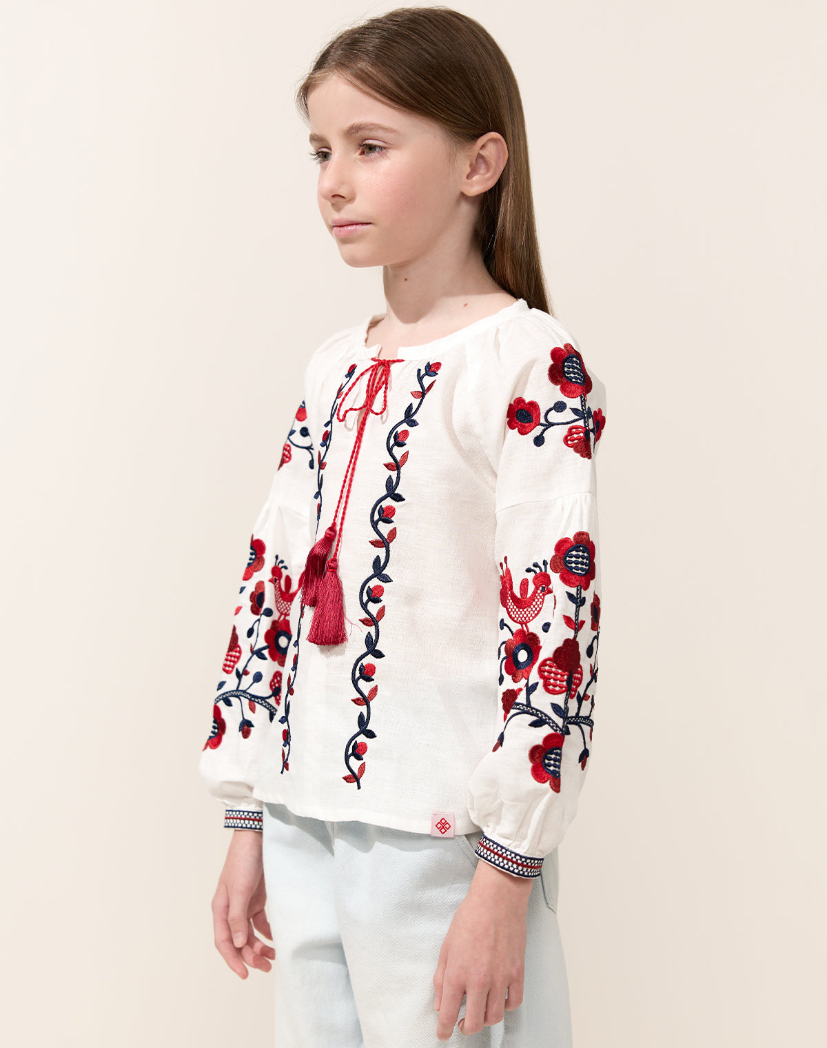 Girls' blouse shirt Kvitkova with colorful embroidery on white linen
