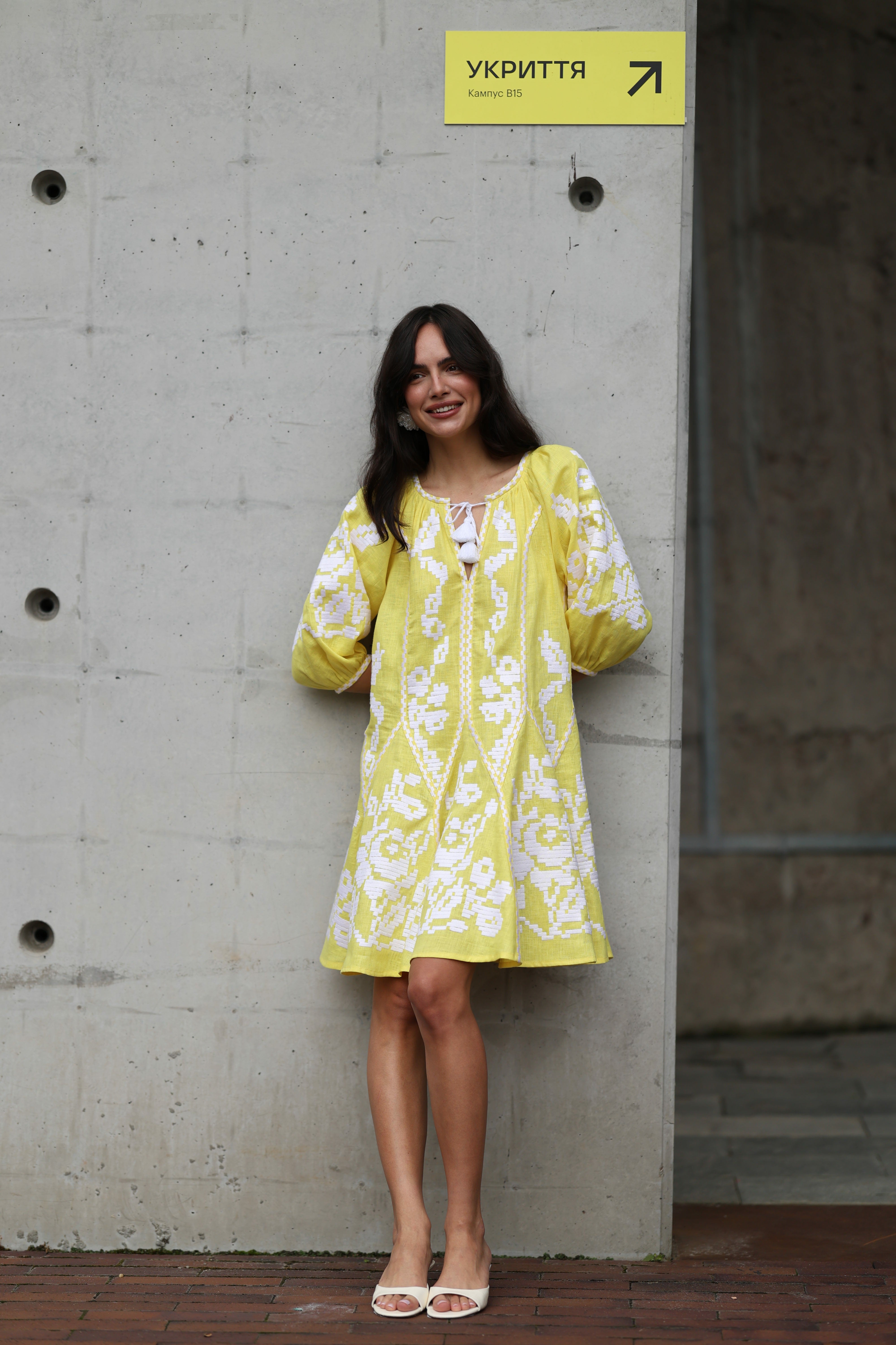 Women's bright yellow embroidered dress with white embroidery