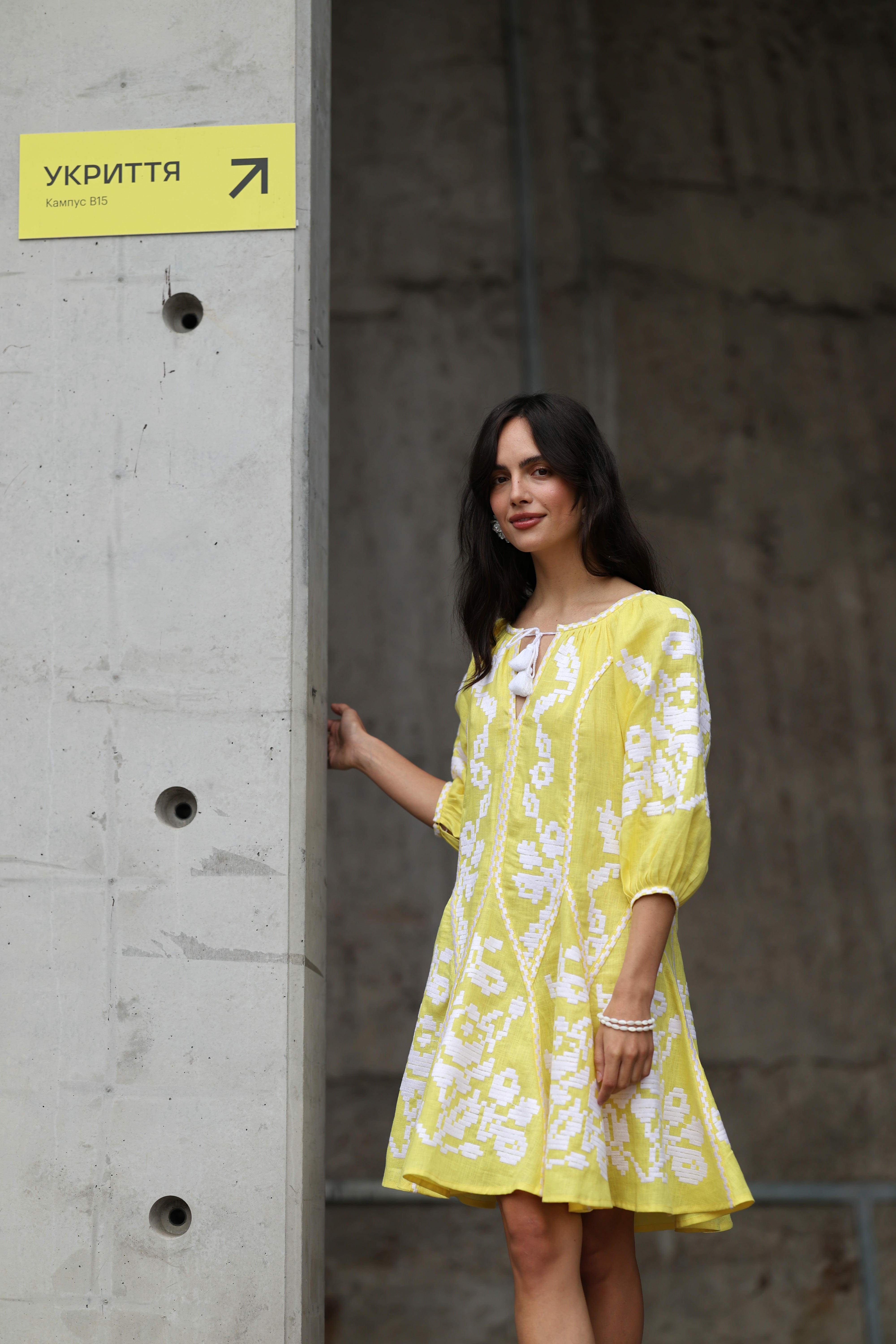 Women's bright yellow embroidered dress with white embroidery