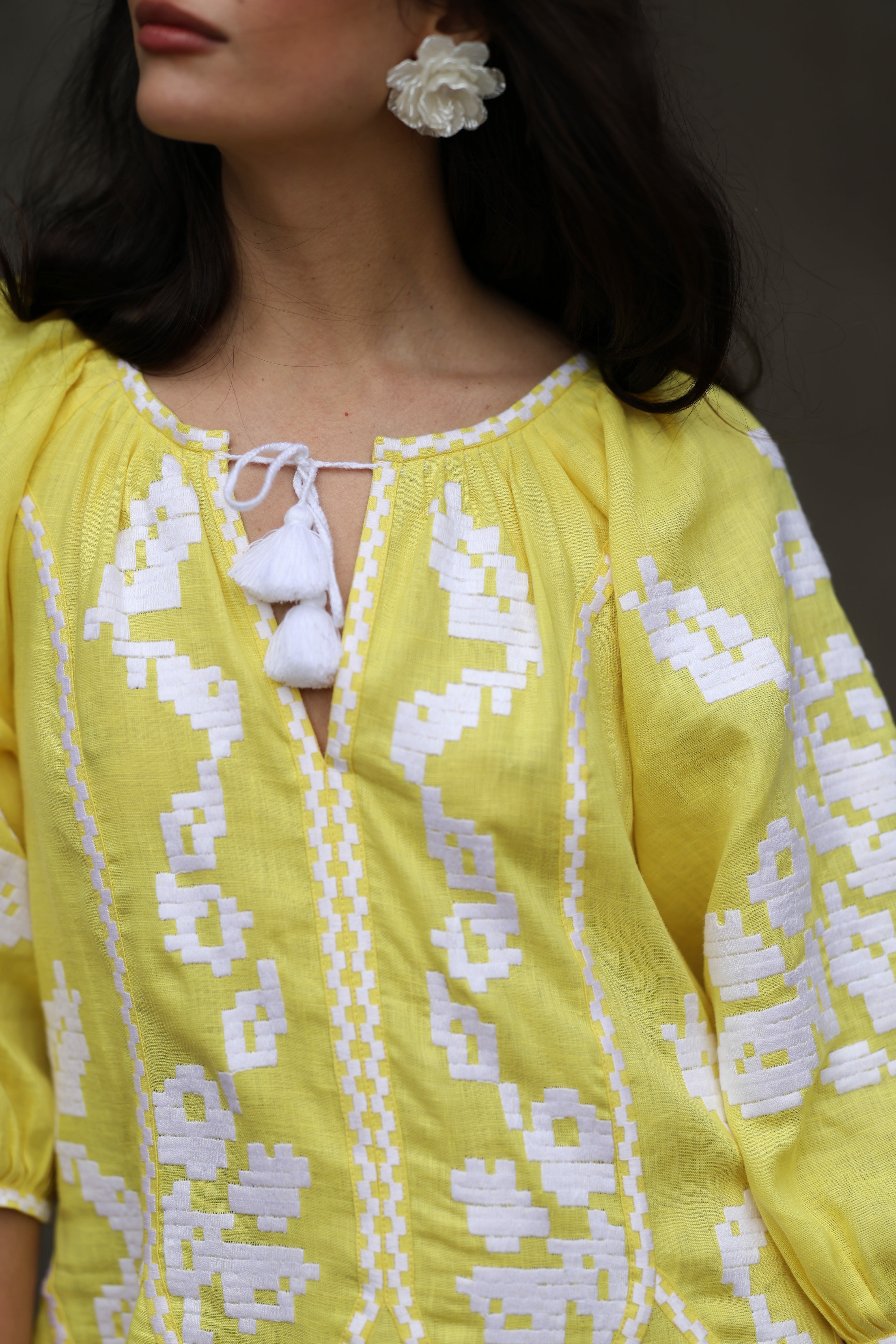 Women's bright yellow embroidered dress with white embroidery