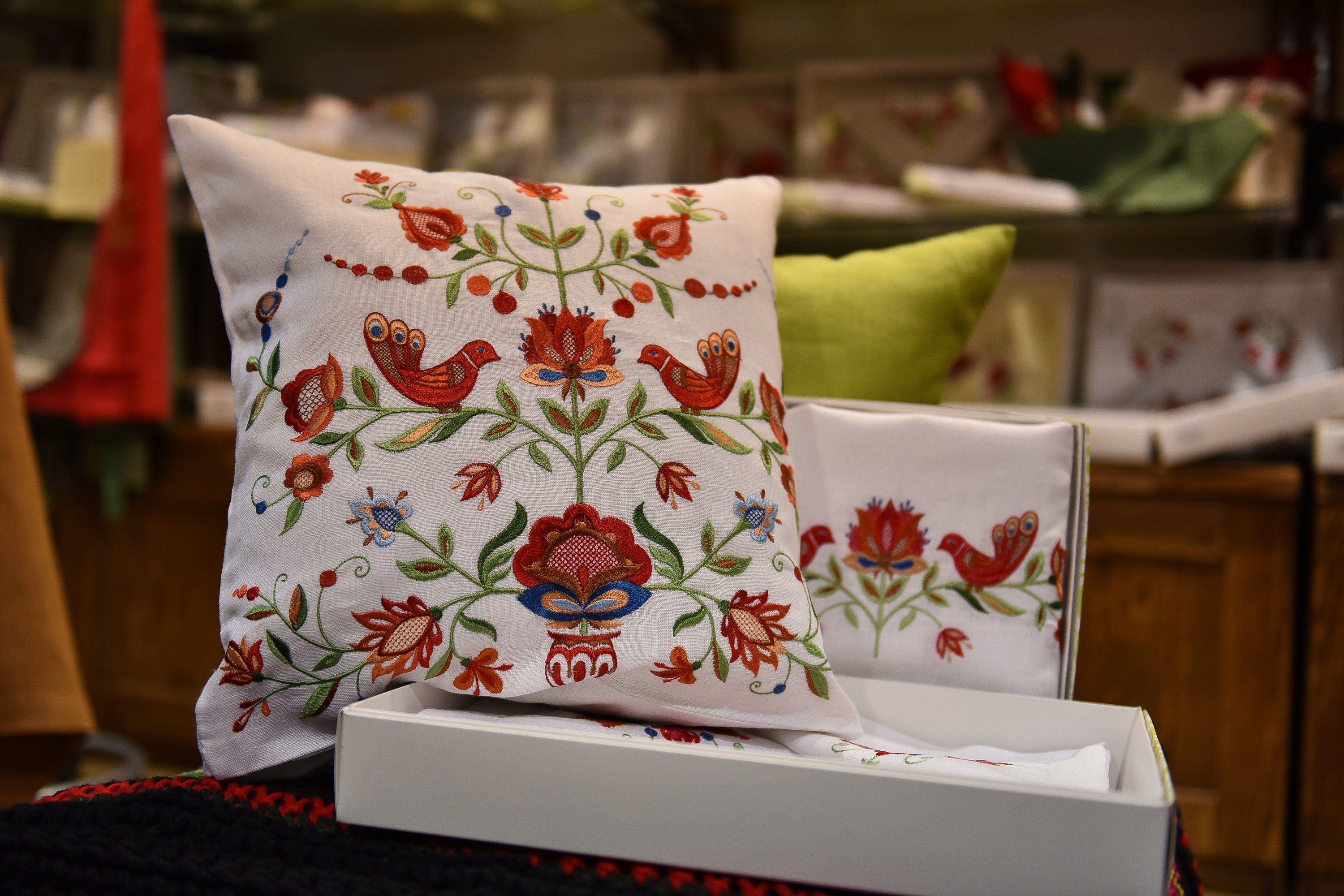 White linen pillowcase with a floral embroidery design