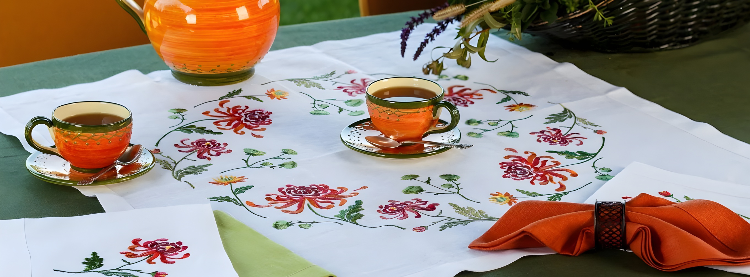 Handmade linen tablecloth featuring authentic Ukrainian floral cross-stitch embroidery by ND Ukraine, perfect for luxury dining room decor.