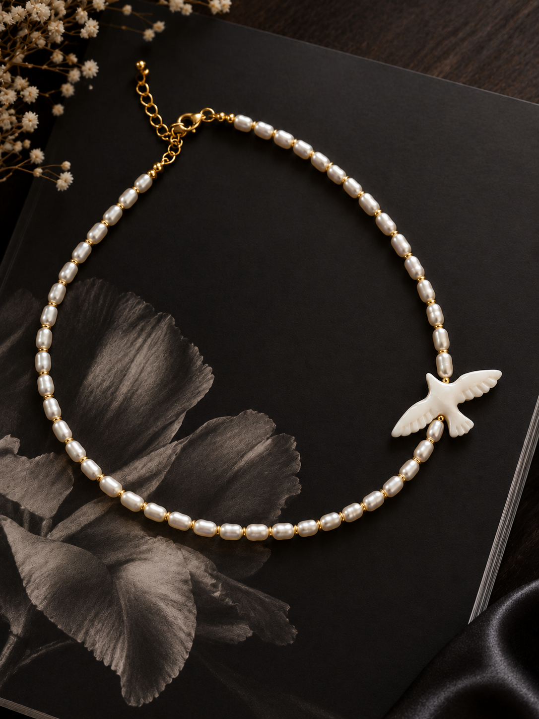 Pearl Necklace with White Bird Pendant