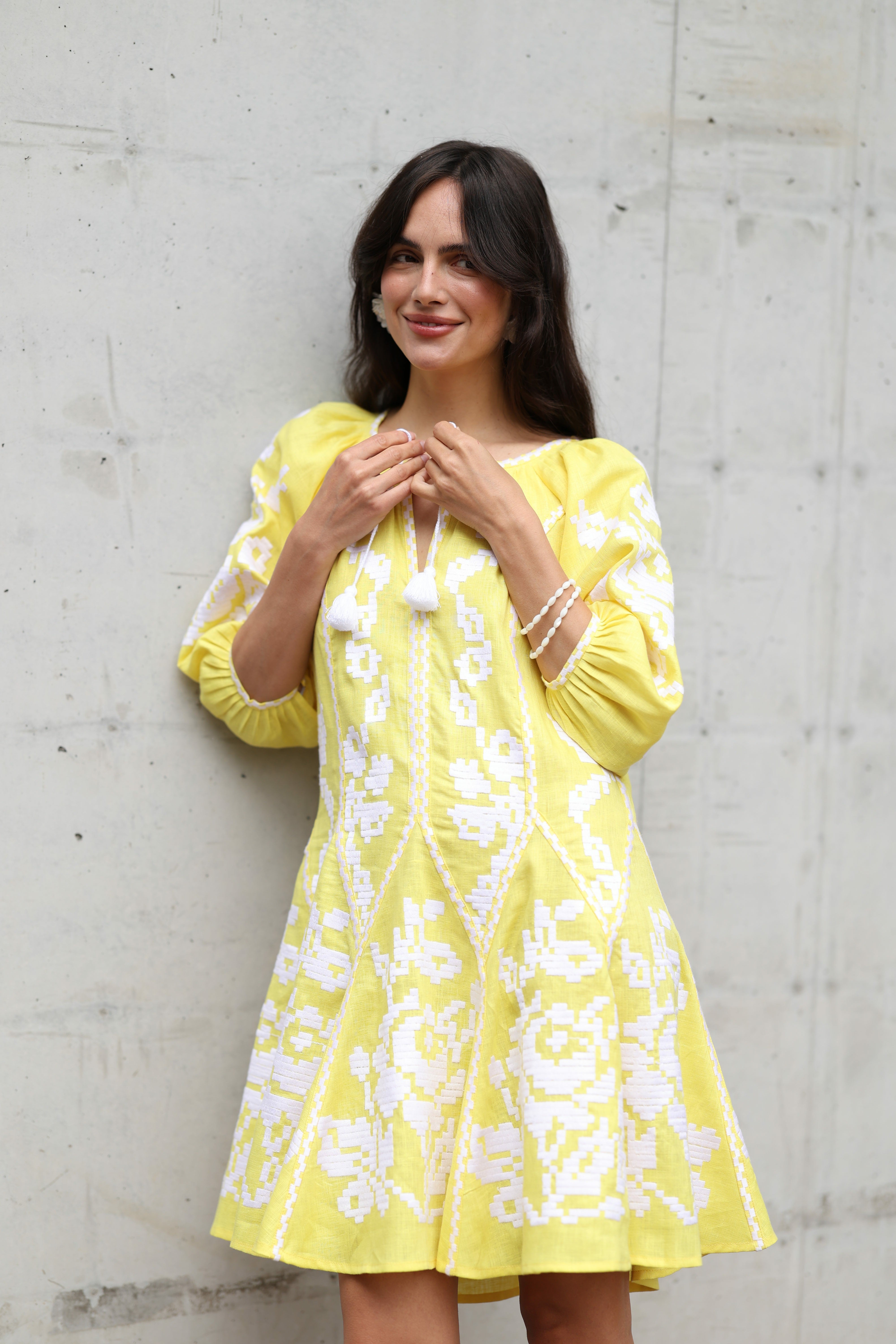Women's bright yellow embroidered dress with white embroidery